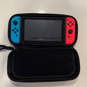 Nintendo Switch with Neon Blue and Red Joy-Con